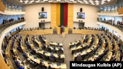 Ukrainian President Volodymyr Zelenskiy speaks to the Lithuanian parliament in Vilnius on April 12.