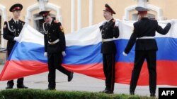 Russian cadets displaying their country's flag.(illustrative photo)