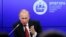 Russian President Vladimir Putin speaks at the St. Petersburg International Economic Forum on May 23. 