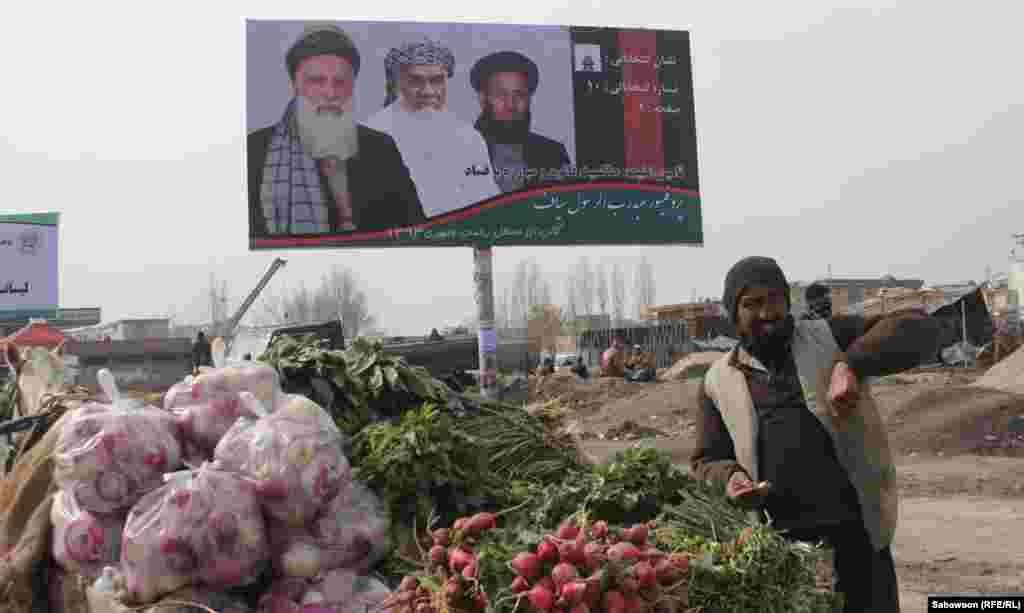 A poster touting the candidacy of former mujahideen leader Abdul Rab Rasul Sayyaf.