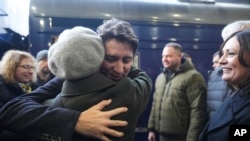 Canada's Prime Minister Justin Trudeau arrives at a train station on the third anniversary of the Russian invasion of Ukraine.