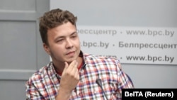 Belarus journalist Raman Pratasevich takes part in a press conference about the forced landing of the Ryanair passenger plane on which he was traveling, in Minsk in June 2021.