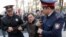KAZAKHSTAN -- Police officers detain an anti-government protester during a rally in Almaty, Kazakhstan March 22, 2019. 