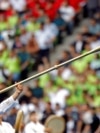 An Uzbekistan soccer fan sounds a traditional trumpet during a World Cup qualifying match in Tashkent in June 2025.<br><br>Uzbekistan fans will descend on Mexico City Stadium on June 17 to watch their team become the first Central Asian country to play at the FIFA World Cup. The team's opening match against Colombia marks the pinnacle, thus far, of Uzbekistan’s century-long love affair with football.