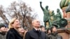 Президент РФ В.Путин и министр культуры О.Любимова на Красной площади 4 ноября