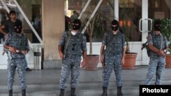 Armenia - Armed police officers guard the entrance to a hospital in Yerevan where opposition gunmen wounded by secrity forces are receiving medical aid, 29Jul2016.