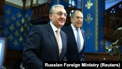 RUSSIA -- Russian Foreign Minister Sergei Lavrov welcomes his Armenian counterpart Zohrab Mnatsakanian (L) during a meeting in Moscow, October 21, 2020