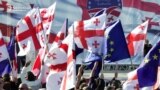 Georgia Opposition Rallies After Car Bombing