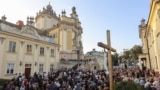 Hundreds gather for a farewell ceremony for the slain former Ukrainian parliamentary speaker Andriy Parubiy in Lviv on September 2.