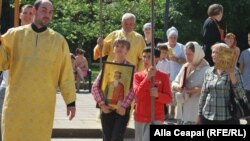 Orthodox believers protest against a march organized by Moldova's lesbian, gay, bisexual, and transgender community in May.