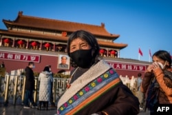 Пекинде жүрген тибеттіктер. 2020 жылдың ақпаны.