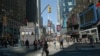 People making their way on Times Square in New York City in this April 25, 2013, file photo. U.S. prosecutors say three arrested suspects plotted to bomb the iconic square and the New York subway for the Islamic State group.