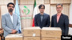 Zoroastrian Parsis from India brought medical supplies for Iran to fight coronavirus. A leader of Iran's Zoroastrian community, Sepanta Niknam (L) March 25, 2020