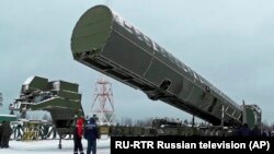 Russia's Sarmat intercontinental missile is shown off to media at an undisclosed location in Russia on March 1, 2018.