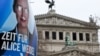 A defaced election campaign poster featuring a portrait of Germany's far-right Alternative for Germany (AfD) party co-leader and main candidate Alice Weidel is pictured in front of the Opera building in Frankfurt am Main, western Germany on February 14, 2