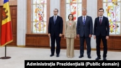 Premierul Vasile Tofan și președinta Maia Sandu la ceremonia de învestire a ministrului Dezvoltării Economice și Digitalizării, Claudiu Năsui, și a ministrului Agriculturii, Eugen Osmochescu.