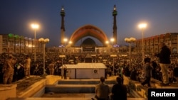 Mourners gather at Tehran's Grand Mosalla prayer grounds to pay final respects to Iran's slain supreme leader, Ayatollah Ali Khamenei, during funeral ceremonies on July 4.