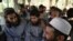 Taliban prisoners await their release from Bagram Prison, north of Kabul, on May 26.