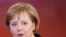 German Chancellor Angela Merkel said Iran "must be prevented"  from developing its nuclear program (