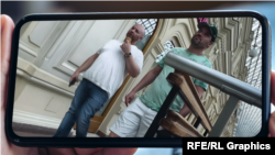 In this image provided to RFE/RL, Kyle Nagy (right) is shown walking in central Moscow in the summer of 2024, some months after he moved to Russia.