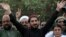 FILE: Manzoor Rashteen, leader of the Pashtun Tahafuz (Protection) Movement (PTM) waves to supporters during a demonstration in Lahore in April 2018.