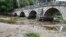 A bridge spans the Bosna River in Bosnia in September.