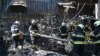 Разбор завалов на месте российского удара по строительному гипермаркету, где погибли 16 человек и 43 получили ранения. Харьков, 26 мая