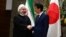 Iranian President Hassan Rohani meets with Japanese Prime Minister Shinzo Abe in Tokyo, December 20, 2019