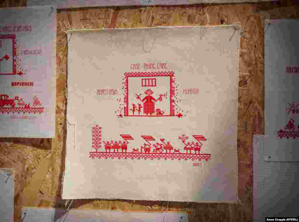 Each artwork highlights an individual prisoner.This cross-stitch illustrates the case of Minsk woman Anastasia Kukhta who ran a hairdressing business until her arrest and imprisonment in 2022 after taking part in anti-government protests. She is serving a five-year sentence for charges that include association with an "extremist formation."