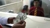 Afghan Woman Wanted In Bank Theft