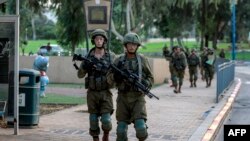 Израил армиясынын жоокерлери Сдерот шаарында. 8-октябрь, 2023-жыл.
