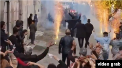 Mourners dance for those killed in recent protests in Iran. With the internet almost completely shut down, getting information out of Iran has been challenging.
