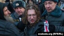 Maksim Vinyarski is detained in Moscow in December 2012.