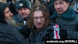 Maksim Vinyarski is detained while protesting in Moscow in December 2012.