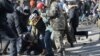This photo from the clashes between protesters and police in Kyiv in 2014 was used by the Trump campaign to highlight the U.S. president's stance on crime.