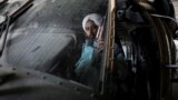 AFGHANISTAN -- BAGRAM -- Vahdat, a Taliban soldier and former prisoner, sits in a military helicopter at Bagram Air Base in Parwan, Afghanistan, September 23, 2021. Picture taken September 23, 2021. WANA (West Asia News Agency) via REUTERS ATTENTION EDITO