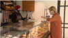 Citizen with mask in a bakery in Sarajevo, Bosnia Herzegovina