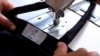 Making a bag in the sewing workshop at the Idrizvovo Correctional Facility