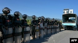 Pakistani soldiers stand guard in Islamabad, October 6, 2024.