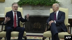 U.S. President Joe Biden meets with Czech Prime Minister Petr Fiala in the Oval Office in Washington on April 15. 