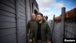 Ukraine's President Volodymyr Zelenskiy inspects new fortifications on a visit to the Donetsk region on April 19. 