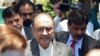 Former Pakistani President Asif Ali Zardari (center) arrives at Islamabad High Court for a bail hearing on June 10. 