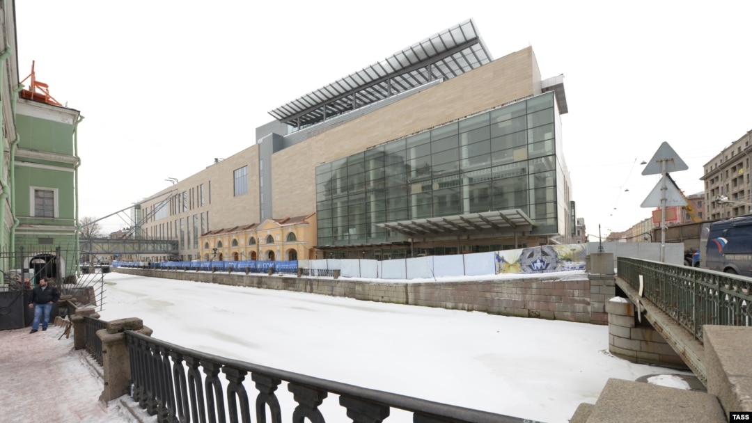 St. Petersburg's Mariinsky Second Stage (right) features soaring glass walls and a rooftop ampitheater located across the canal from the grand original theater (left).