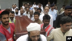 Mourners carry the coffin of journalist Syed Saleem Shahzad, who was killed in Pakistan this week. The country was listed by the Committee to Protect Journalists as one of the worst offenders in its 2011 Impunity Index
