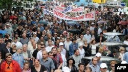 Opposition supporters block traffic in Tbilisi on May 21.