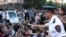 Armenia -- Valeri Osipian, a deputy chief of the Yerevan police, urges protesters to unblock a street, Yerevan, 14 July, 2015 