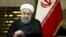 Iran-- Iranian President Hassan Rouhani said on Sunday that, if its interests were protected, Tehran would remain committed to its 2015 nuclear deal, May 13, 2018.