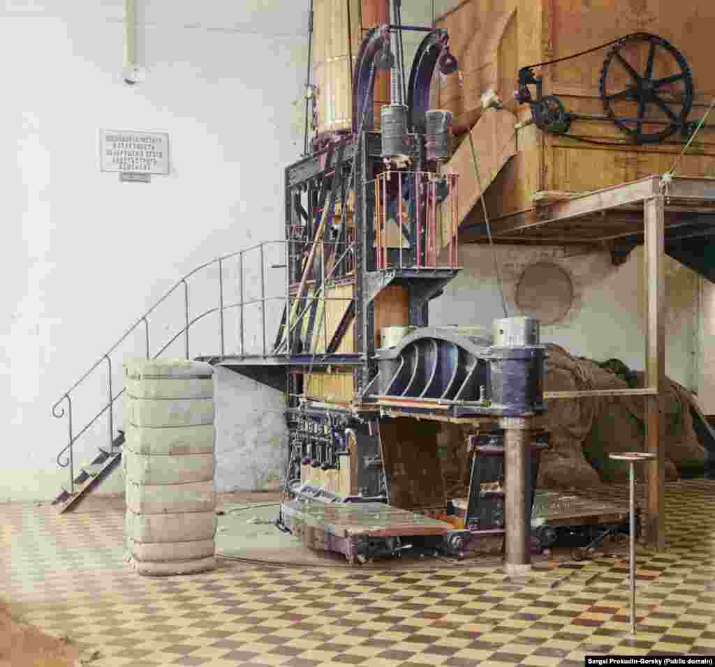 The inside of a factory in which bales of cotton were pressed. The sign on the wall warns workers to keep the space &ldquo;clean and tidy,&rdquo; adding, &ldquo;Violators will be strictly punished.&rdquo; Gorsky perfected an&nbsp;early method&nbsp;of color photography that required&nbsp;three separate images&nbsp;of each scene to be shot with color filters. When the three glass plates were developed and had red, green, and blue light shone through them, a color image could be projected. &nbsp; &nbsp;