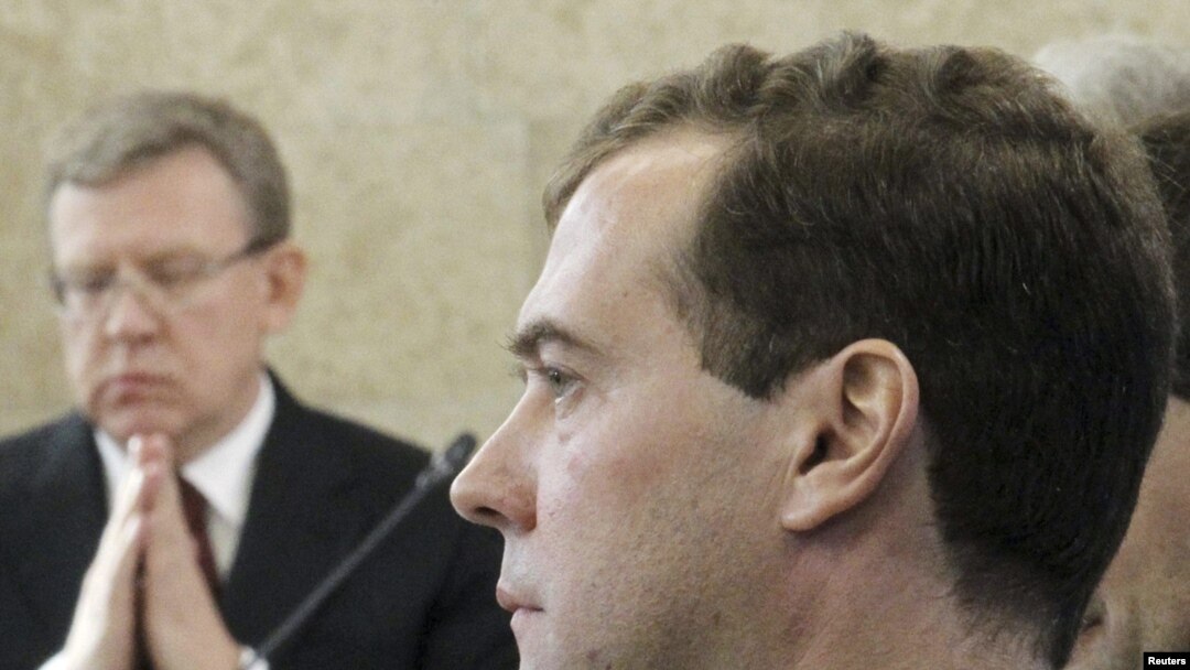 Russian Finance Minister Alexei Kudrin (left) attends a meeting of the Modernization Commission headed by President Dmitry Medvedev in the city of Dimitrovgrad, just hours before his resignation. 