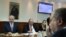 Israeli Prime Minister Benjamin Netanyahu (L) sits across from Defense Minister Avigdor Lieberman as he chairs a weekly cabinet meeting. File photo